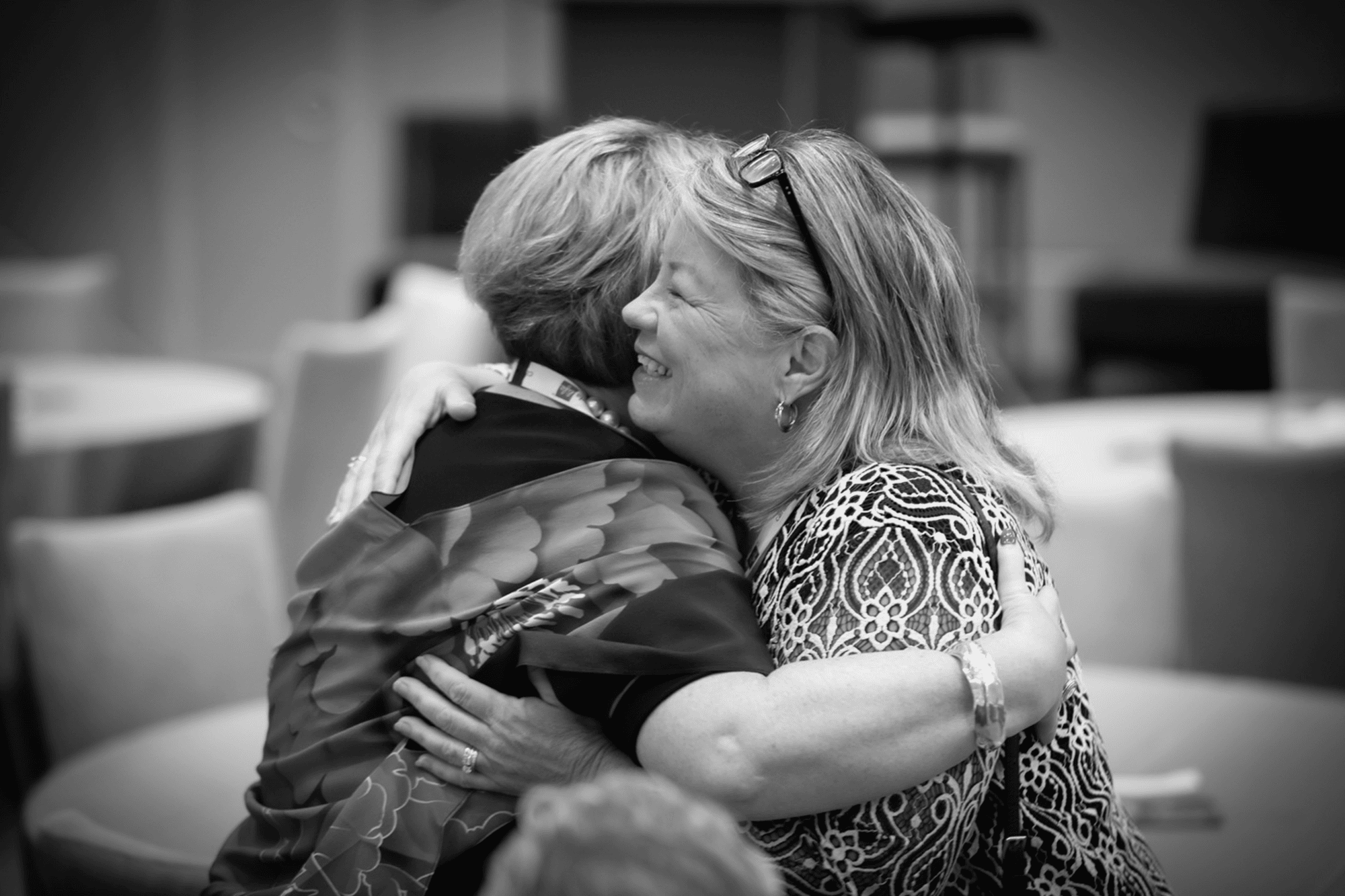 Guest embracing at a Kinship Event